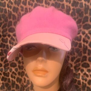 Cap with a pink braid